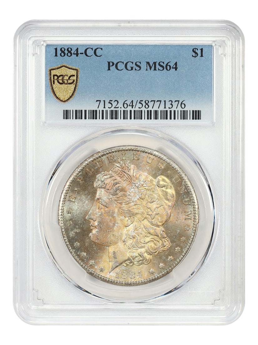 PCGS MS64 Carson City 1884 Morgan Silver Dollar: PCGS MS64 Carson City 1884 Morgan Silver Dollar This is an 1884-CC Morgan Dollar graded MS64 by PCGS. The coin is uncirculated and was minted in Carson City. It is part of the Morgan Dollar series and