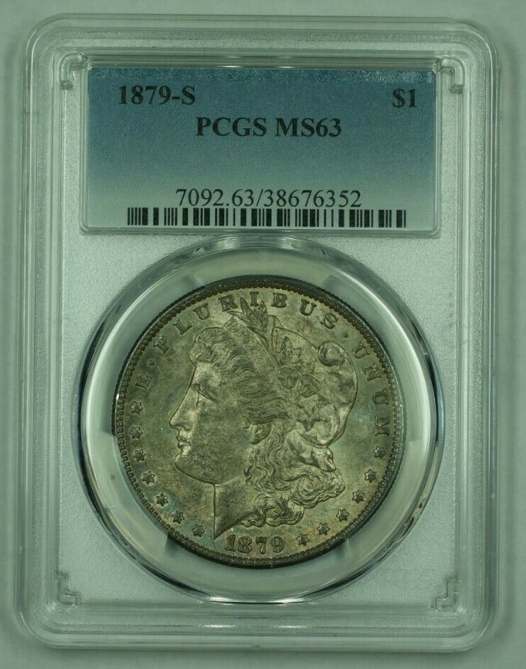 PCGS MS-63 1879-S Morgan Silver Dollar with Colorful Toning: PCGS MS-63 1879-S Morgan Silver Dollar with Colorful Toning This is an 1879-S Morgan Silver Dollar graded MS-63 by PCGS. Minted in San Francisco, the coin features attractive toning and is composed of