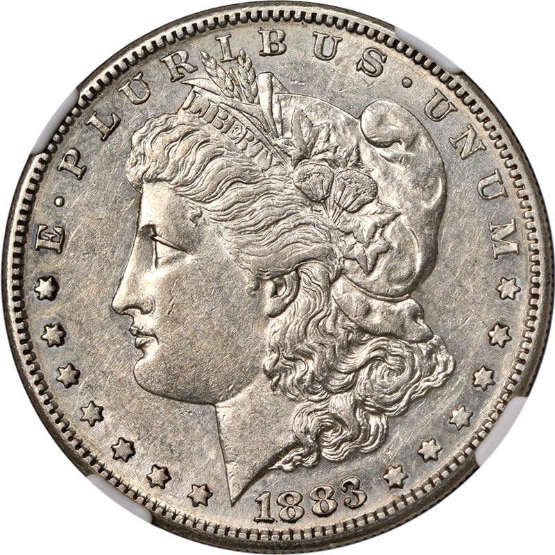 1883-S Morgan Silver Dollar NGC AU55 Stunning Eye Appeal: 1883-S Morgan Silver Dollar NGC AU55 Stunning Eye Appeal This 1883-S Morgan Silver Dollar, certified by NGC with a grade of AU55, offers impressive eye appeal, featuring nice luster and a strong strik