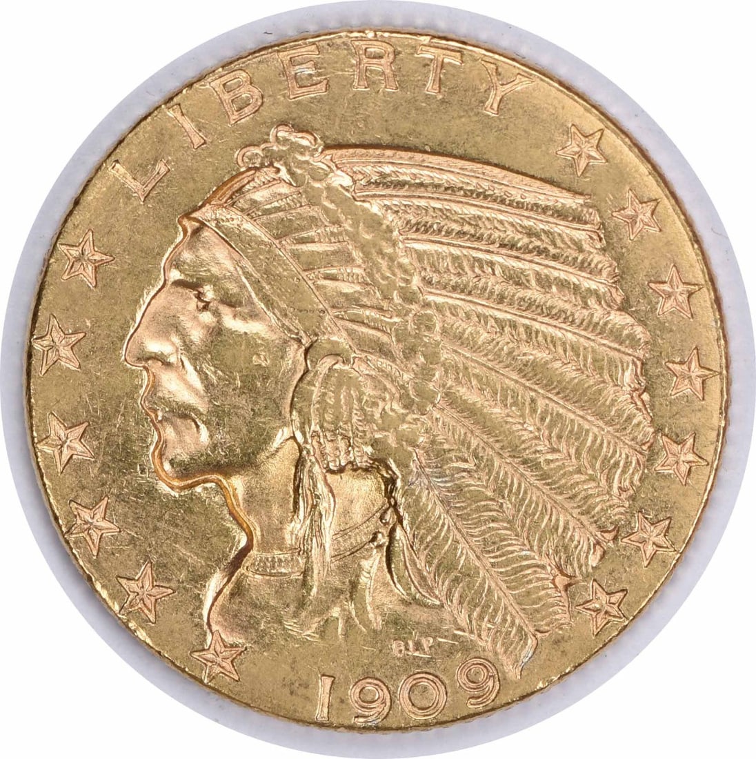 1909-D $5 Gold Indian Coin by Bela Lyon Pratt Uncertified: 1909-D $5 Gold Indian Coin by Bela Lyon Pratt Uncertified This is a 1909-D $5 Gold Indian coin, featuring a design by Bela Lyon Pratt. It has a composition of 90% gold and 10% copper, with a fineness