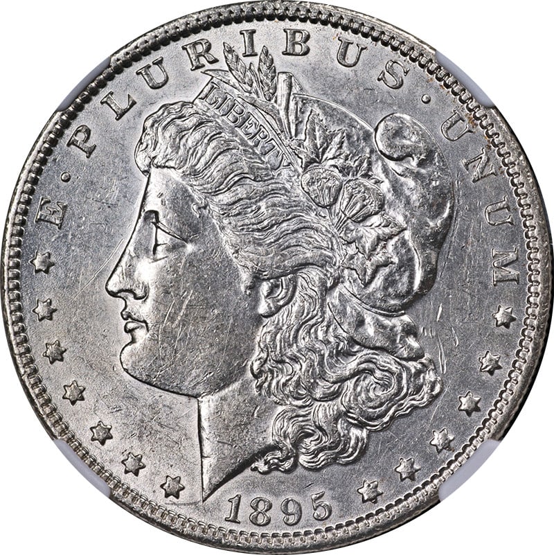 NGC AU55 1895-O Morgan Dollar Silver Coin with Strong Luster: NGC AU55 1895-O Morgan Dollar Silver Coin with Strong Luster This 1895-O Morgan Silver Dollar is certified by NGC with an AU55 grade, displaying impressive luster and strong strike. The coin has a bri