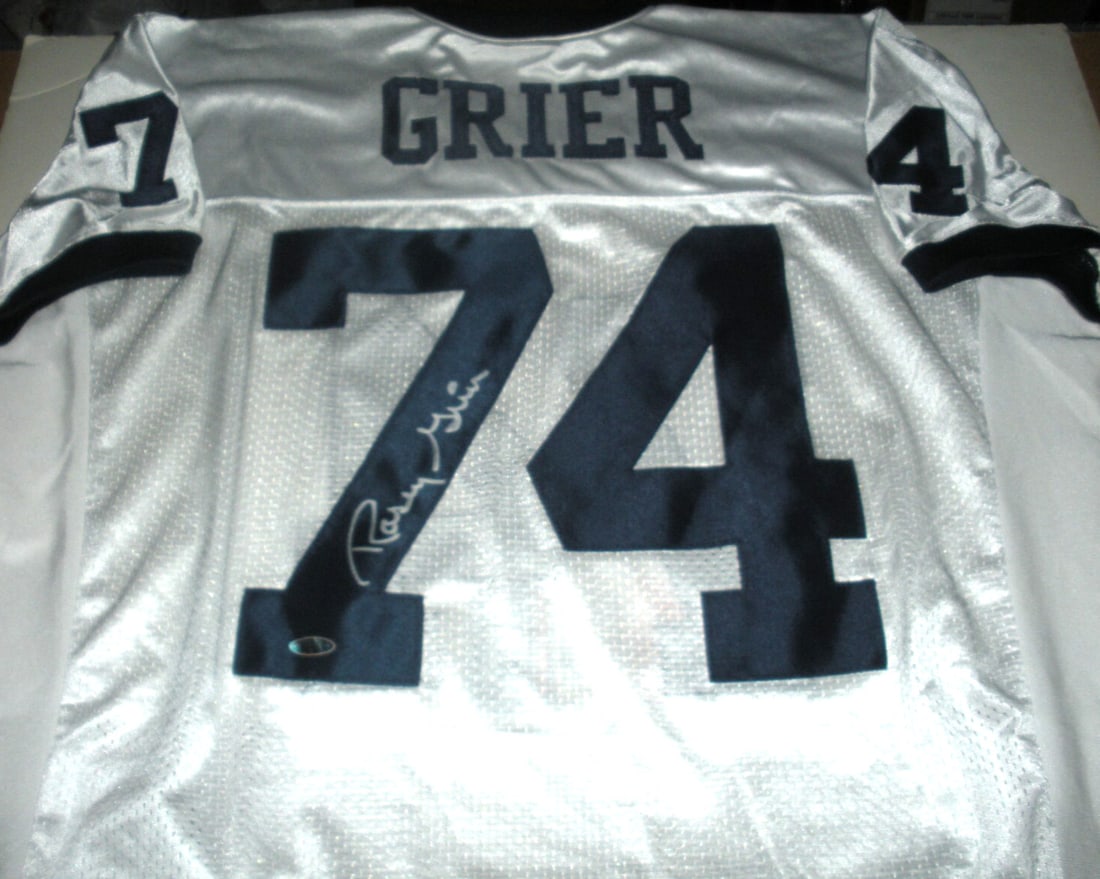 Rosey Grier Signed Penn State Lions Nike Jersey with COA: Rosey Grier Signed Penn State Lions Nike Jersey with COA This officially licensed Nike jersey is signed by Rosey Grier, a former NFL player known for his time with the Penn State Lions. The jersey is