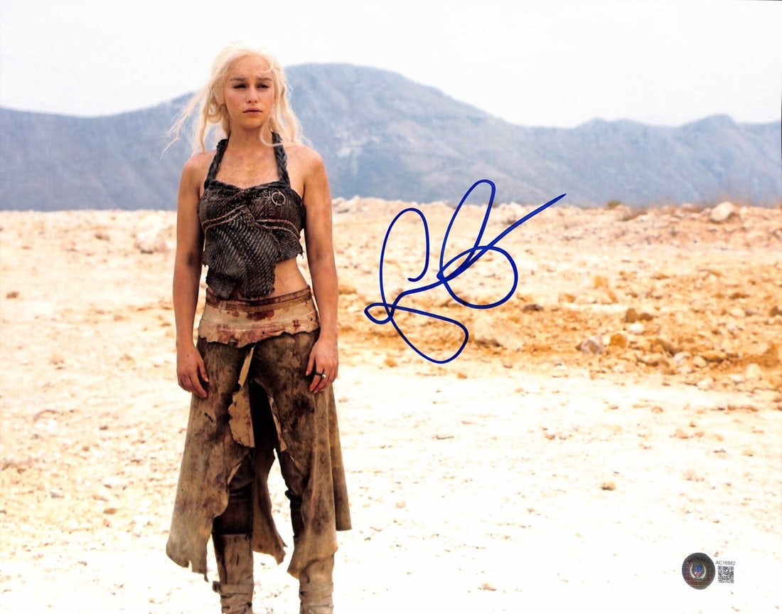 Emilia Clarke Signed 11x14 Photo Game of Thrones Beckett Authenticated: Emilia Clarke Signed 11x14 Photo Game of Thrones Beckett Authenticated Enhance your collection with this stunning 11x14 photograph signed by Emilia Clarke, famously known for her role as Daenerys Targ
