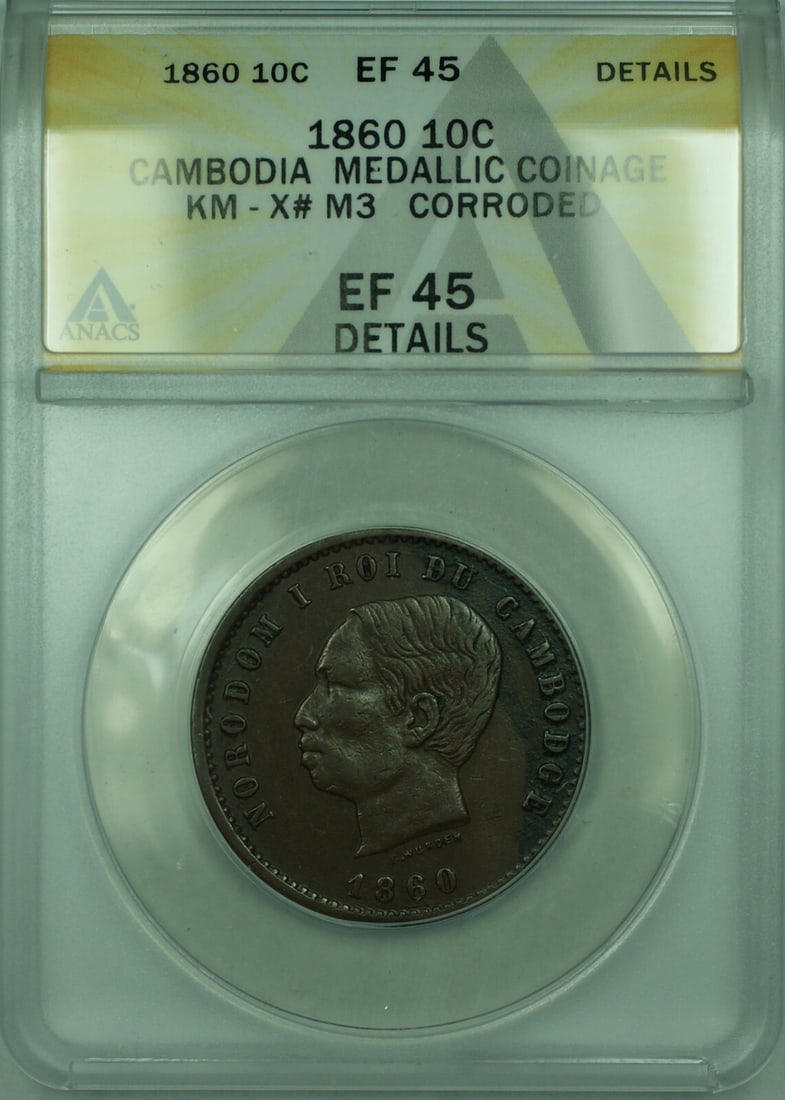 Cambodia 1860 Bronze 10 Centimes ANACS XF 45 KM-X#M3: Cambodia 1860 Bronze 10 Centimes ANACS XF 45 KM-X#M3 This is a Cambodia 10 Centimes coin from 1860, featuring medallic coinage design. The coin is composed of bronze and has a brown coloration. It has