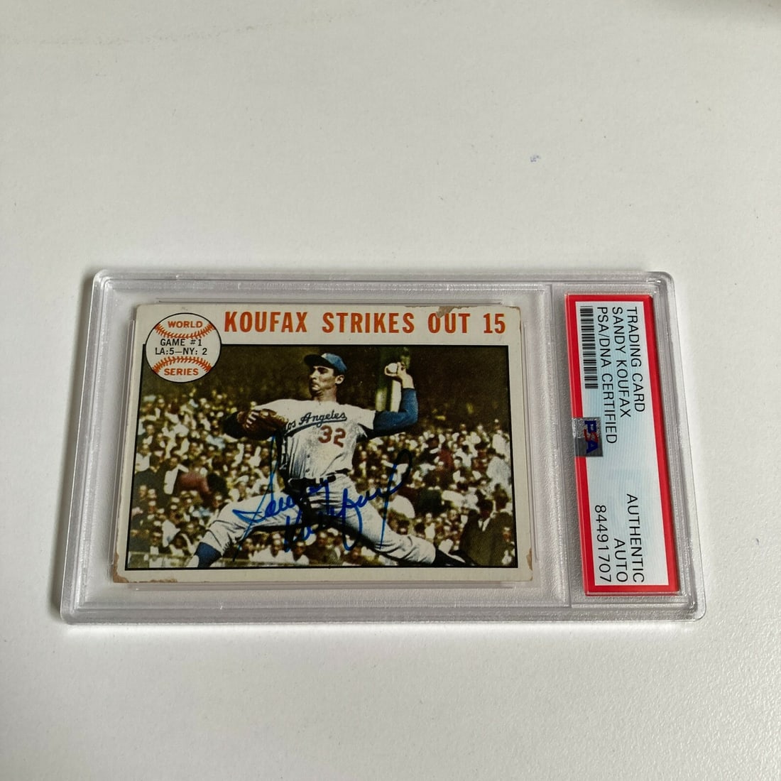 1964 Topps Sandy Koufax Signed Card PSA DNA COA Dodgers: 1964 Topps Sandy Koufax Signed Card PSA DNA COA Dodgers This is a 1964 Topps Sandy Koufax signed baseball card, celebrating one of the greatest pitchers in baseball history. The card features Koufax i
