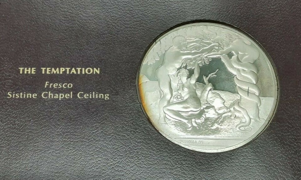 Genius of Michelangelo Sterling Silver Medal The Temptation by Franklin Mint: Genius of Michelangelo Sterling Silver Medal The Temptation by Franklin Mint This Franklin Mint Genius of Michelangelo proof medal, titled 'The Temptation,' was produced in 1970 as part of a silver me
