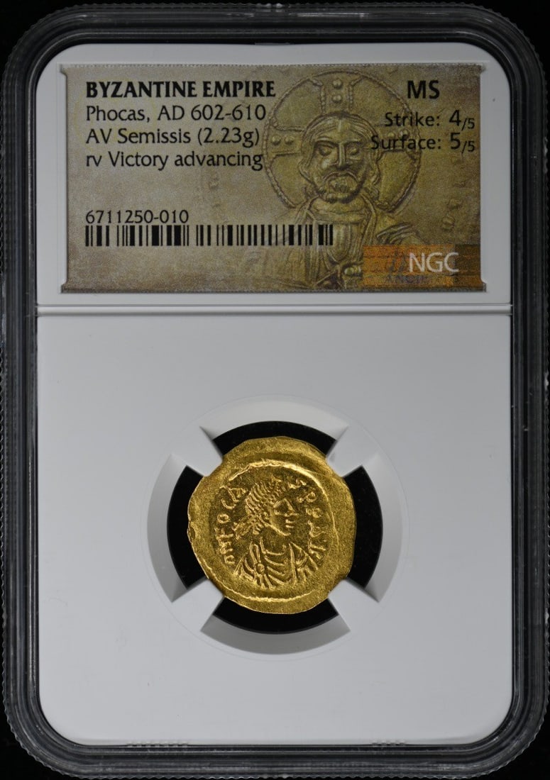 Phocas AD 602-610 Byzantine Empire Gold Semissis NGC MS60: Phocas AD 602-610 Byzantine Empire Gold Semissis NGC MS60 This is a historical AV Semissis coin from the Byzantine Empire, minted during the reign of Phocas, dated AD 602-610. The coin has been certif