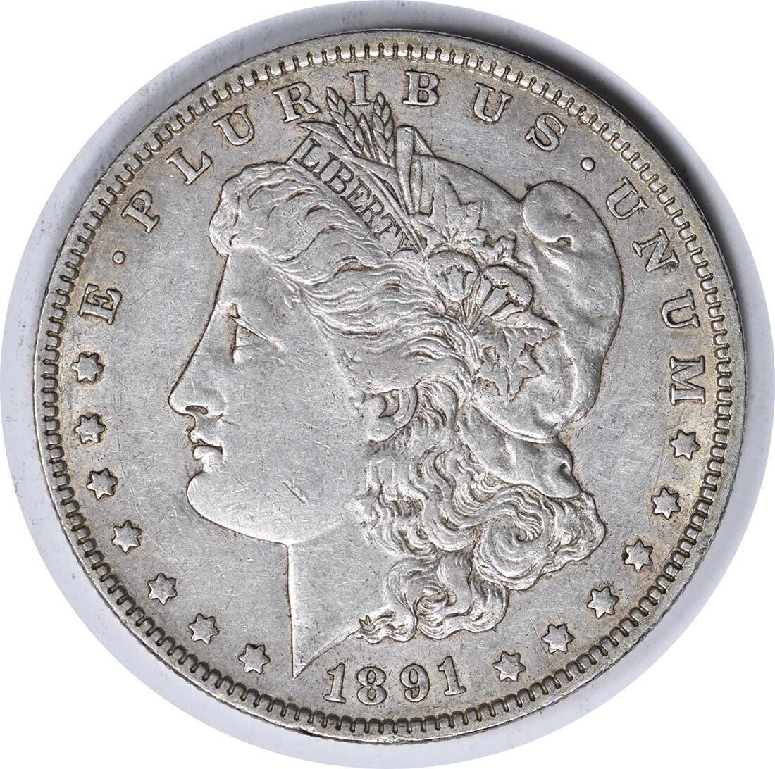 1891-O Morgan Silver Dollar Uncertified New Orleans Mint Coin: 1891-O Morgan Silver Dollar Uncertified New Orleans Mint Coin This 1891-O Morgan Silver Dollar is a historical piece featuring a composition of 90% silver and 10% copper, minted in New Orleans. The co