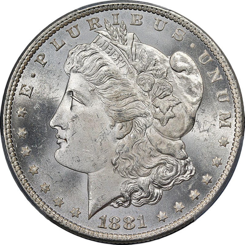 PCGS MS63 1881-O Morgan Dollar Uncirculated Silver Coin Blast White: PCGS MS63 1881-O Morgan Dollar Uncirculated Silver Coin Blast White This 1881-O Morgan Silver Dollar is certified by PCGS with a grade of MS63. The coin features excellent luster, a strong strike, and