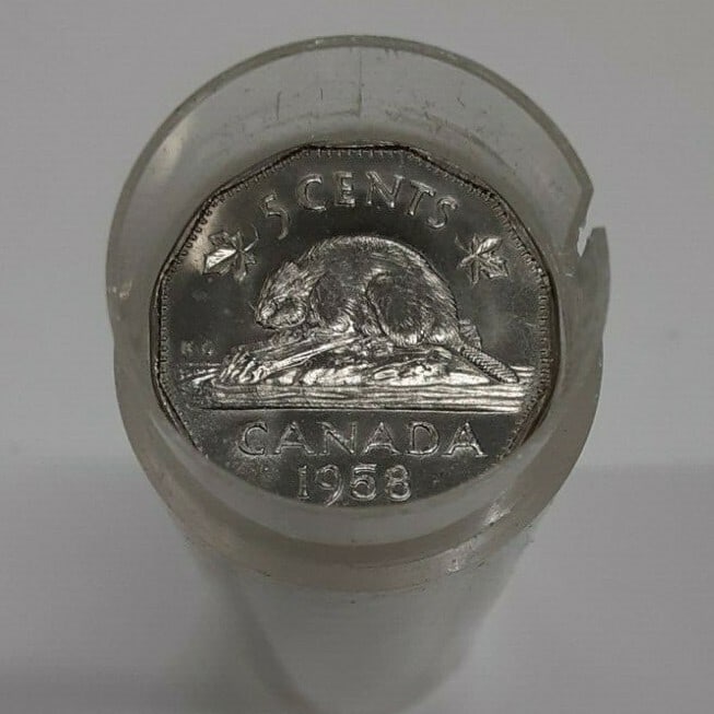 1958 Canadian 5 Cent Uncirculated Roll of 40 Coins: 1958 Canadian 5 Cent Uncirculated Roll of 40 Coins This is a roll of 40 uncirculated 1958 Canadian 5 cent coins, commonly referred to as 'nickels.' The coins are presented in a tube and remain uncerti