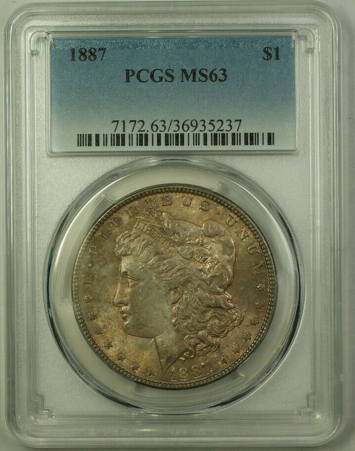 PCGS MS63 1887 Morgan Dollar Silver Coin Toned Obverse Philadelphia: PCGS MS63 1887 Morgan Dollar Silver Coin Toned Obverse Philadelphia This is an 1887 Morgan Silver Dollar $1 coin, certified by PCGS with a grade of MS-63. The coin features a toned obverse and is comp