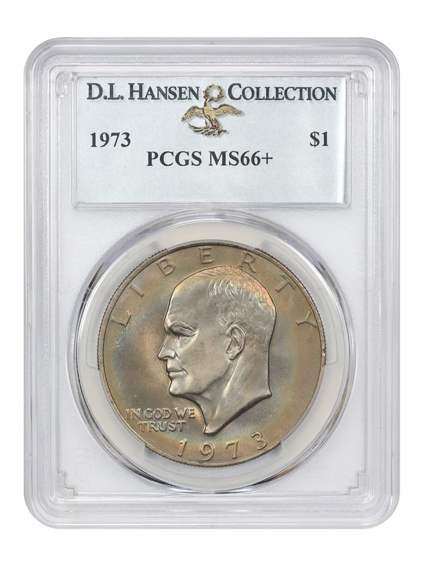 1973 $1 PCGS MS66+ Ike Dollar with Rainbow Toning: 1973 $1 PCGS MS66+ Ike Dollar with Rainbow Toning This stunning 1973 $1 Ike Dollar, certified by PCGS with a grade of MS66+, showcases remarkable rainbow toning that enhances its brilliant mint luster