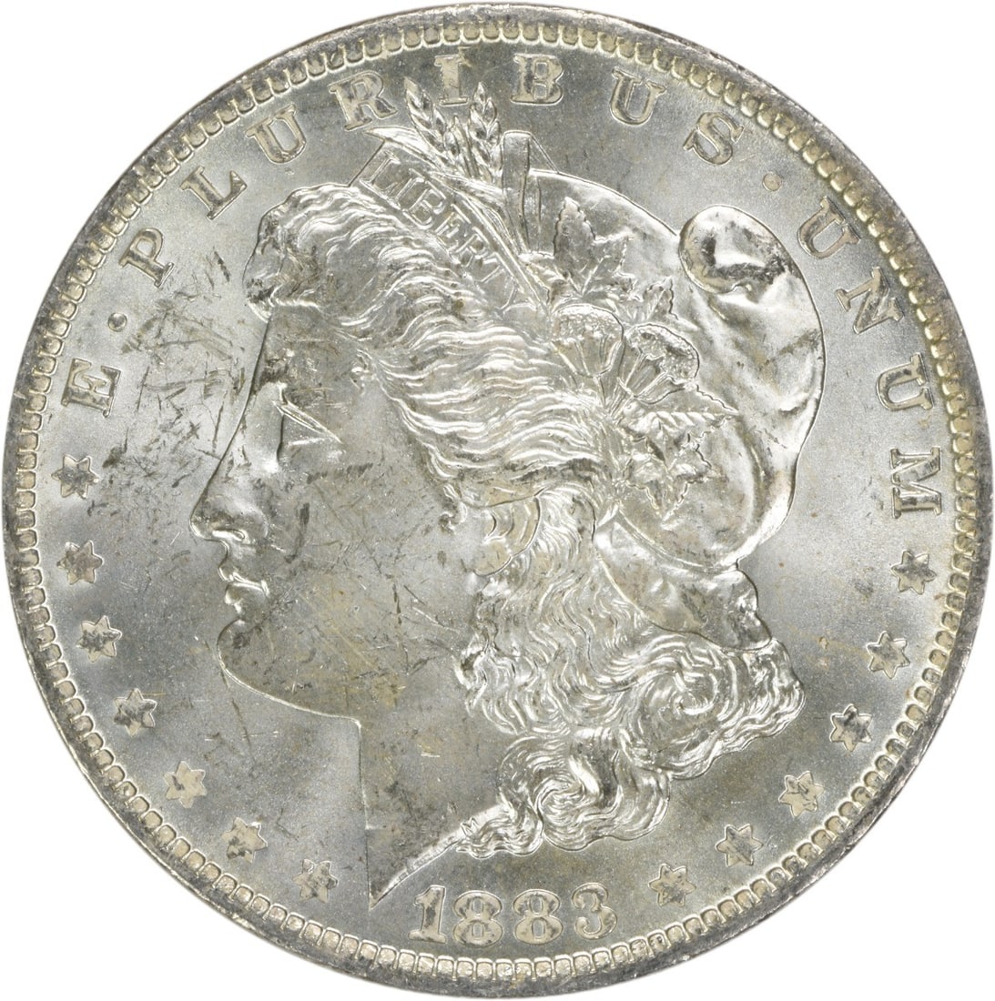 1883-O Morgan Silver Dollar Uncertified Brilliant Uncirculated: 1883-O Morgan Silver Dollar Uncertified Brilliant Uncirculated This 1883-O Morgan Silver Dollar is an uncirculated coin, showcasing its brilliant, unblemished surface. Struck in silver, this coin is a