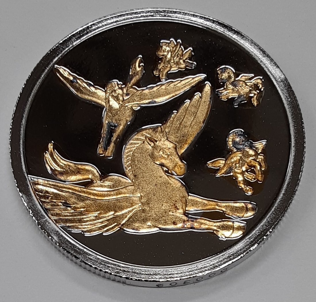 Rarities Mint 1oz Silver Pegasus Coin Commemorating Fantasia 50th Anniversary: Rarities Mint 1oz Silver Pegasus Coin Commemorating Fantasia 50th Anniversary This 1oz silver round commemorates the 50th anniversary of Disney's Fantasia. Minted by Rarities Mint in the United States