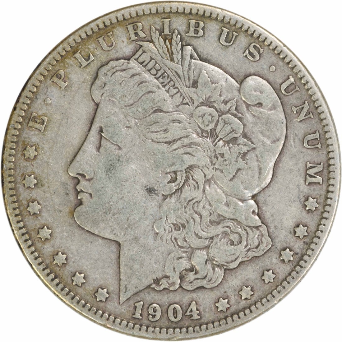 1904 Morgan Silver Dollar EF George T Morgan 90% Silver: 1904 Morgan Silver Dollar EF George T Morgan 90% Silver This 1904 Morgan Silver Dollar is an exceptional piece of American numismatic history. The coin, designed by George T. Morgan, features a compos