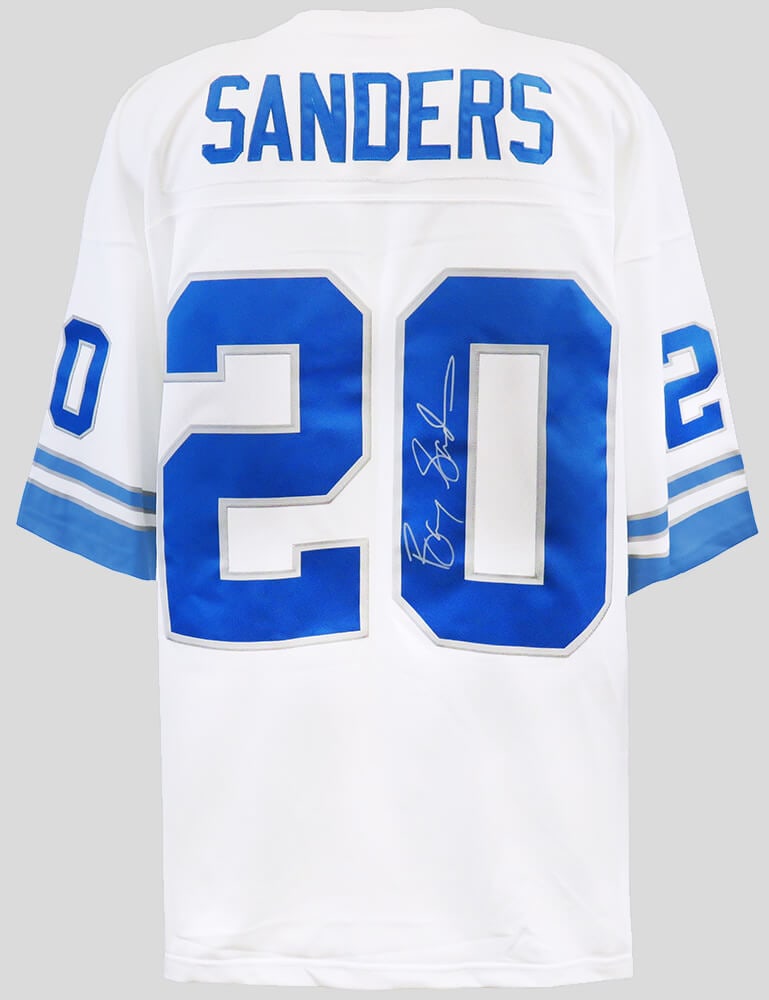 Barry Sanders Signed 1996 Lions NFL Legacy Jersey with COA: Barry Sanders Signed 1996 Lions NFL Legacy Jersey with COA Celebrate the legacy of Barry Sanders with this original signed Detroit Lions white 1996 throwback jersey by Mitchell & Ness. This authentic