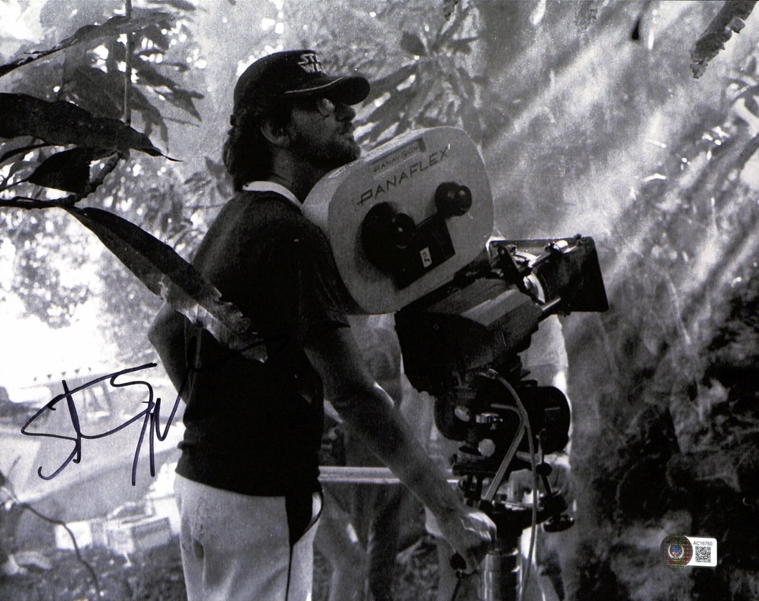 Steven Spielberg Autographed Indiana Jones 11x14 Photo Beckett Graded 10: Steven Spielberg Autographed Indiana Jones 11x14 Photo Beckett Graded 10 This is an original 11x14 inch black and white photograph signed by filmmaker and director Steven Spielberg, known for his work