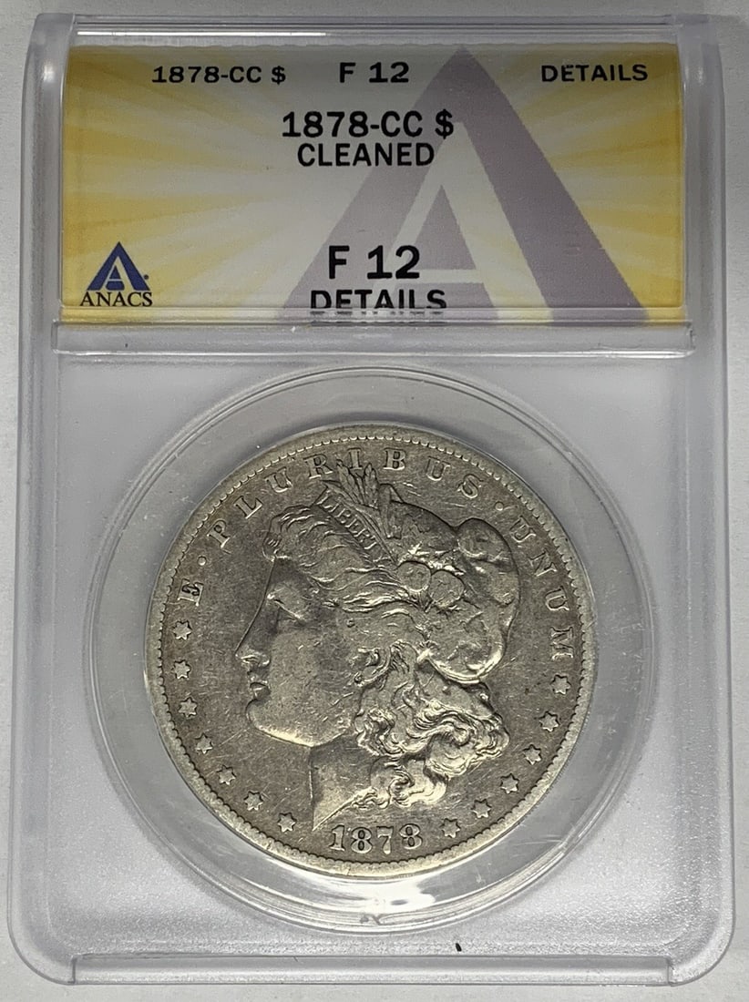Carson City 1878-CC Morgan Dollar Silver Coin ANACS F 12 Cleaned: Carson City 1878-CC Morgan Dollar Silver Coin ANACS F 12 Cleaned This 1878-CC Morgan Silver Dollar is a circulated coin certified by ANACS with a grade of F 12 Details and noted as cleaned. Minted in