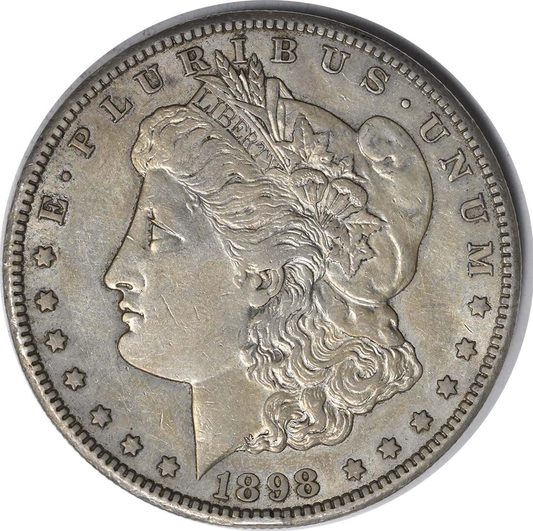 1898-S Morgan Silver Dollar AU Uncertified 90% Silver San Francisco: 1898-S Morgan Silver Dollar AU Uncertified 90% Silver San Francisco This 1898-S Morgan Silver Dollar is an exquisite piece for collectors, featuring a design by George T. Morgan. This coin, minted in
