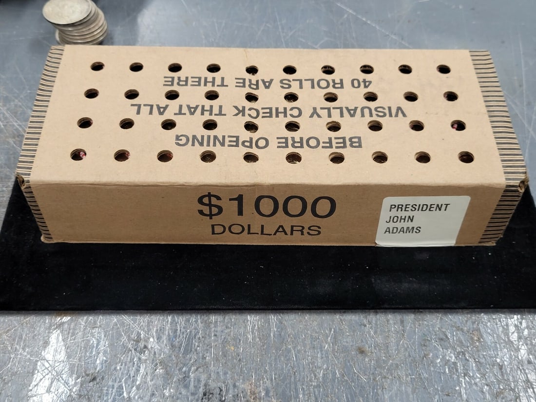 Sealed Box of 1000 2007-P John Adams Presidential $1 Coins Uncirculated: Sealed Box of 1000 2007-P John Adams Presidential $1 Coins Uncirculated This is an original sealed box containing 1,000 uncirculated 2007-P John Adams Presidential Dollar coins. Each coin was minted a