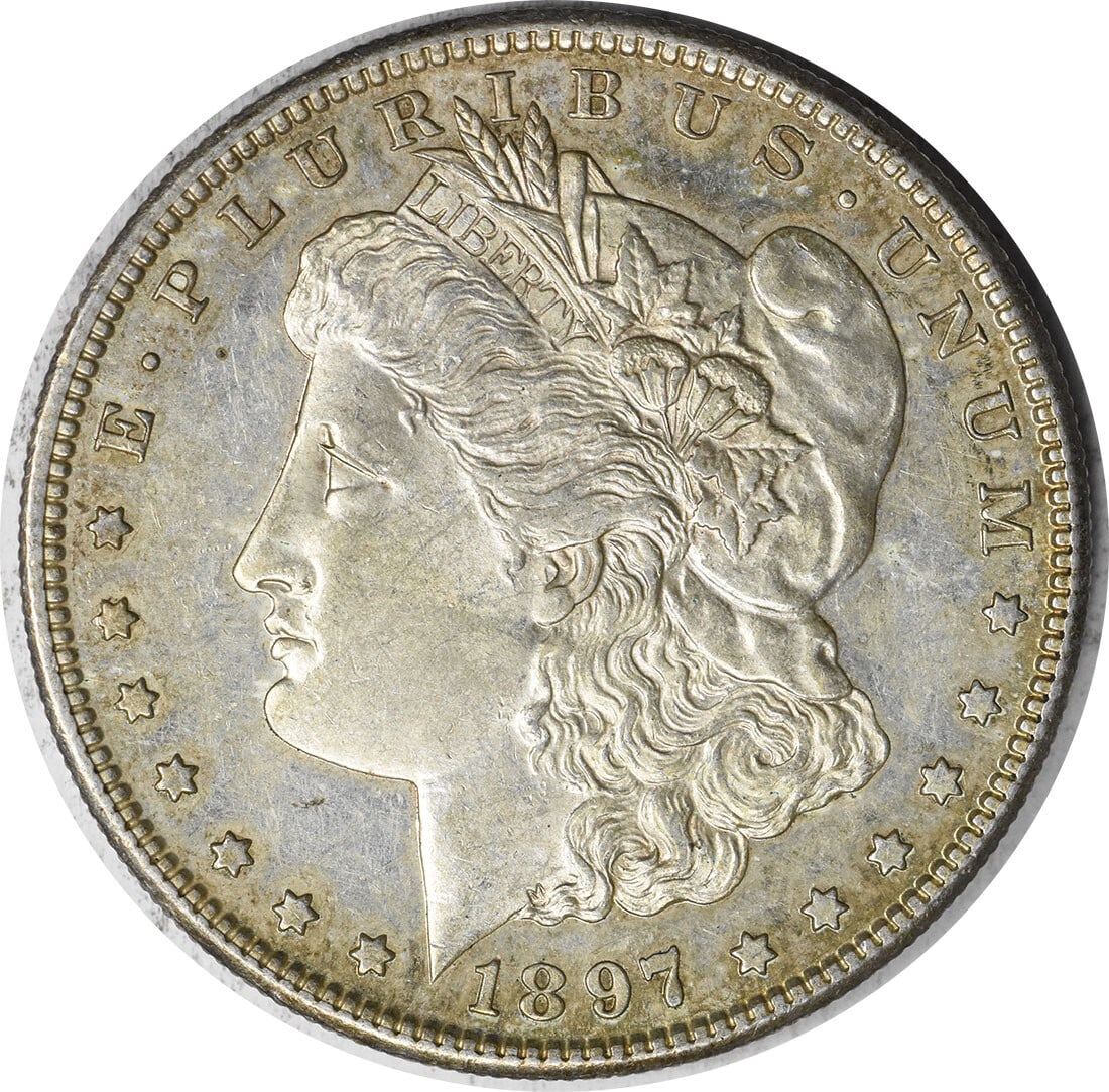 1897 San Francisco Morgan Dollar AU Grade Uncertified Silver Coin: 1897 San Francisco Morgan Dollar AU Grade Uncertified Silver Coin This is an 1897-S Morgan Silver Dollar from the San Francisco Mint. The coin features a composition of 90% silver and 10% copper, desi