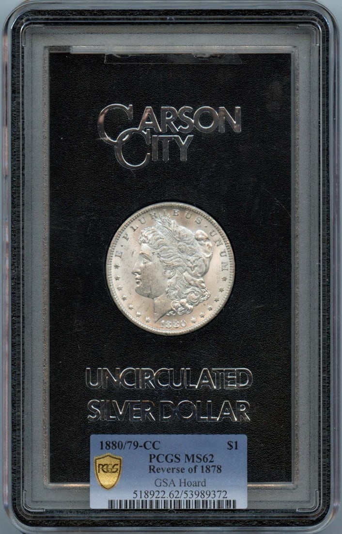 PCGS MS62 1880/79-CC Morgan Silver Dollar GSA Hoard Carson City: PCGS MS62 1880/79-CC Morgan Silver Dollar GSA Hoard Carson City This is an 1880/79-CC Morgan Dollar featuring the Reverse of 1878, part of the GSA Hoard. The coin is certified by PCGS with a grade of
