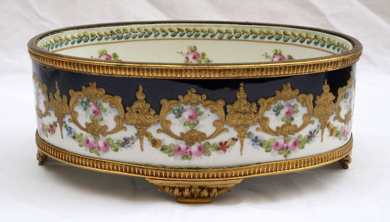 19th Century Sevres Hand Painted Enameled Bowl with Bronze Base: 19th Century Sevres Hand Painted Enameled Bowl with Bronze Base Presenting a stunning 19th-century French Sevres centerpiece bowl, a true museum-quality piece. This exquisite bowl features a vibrant b