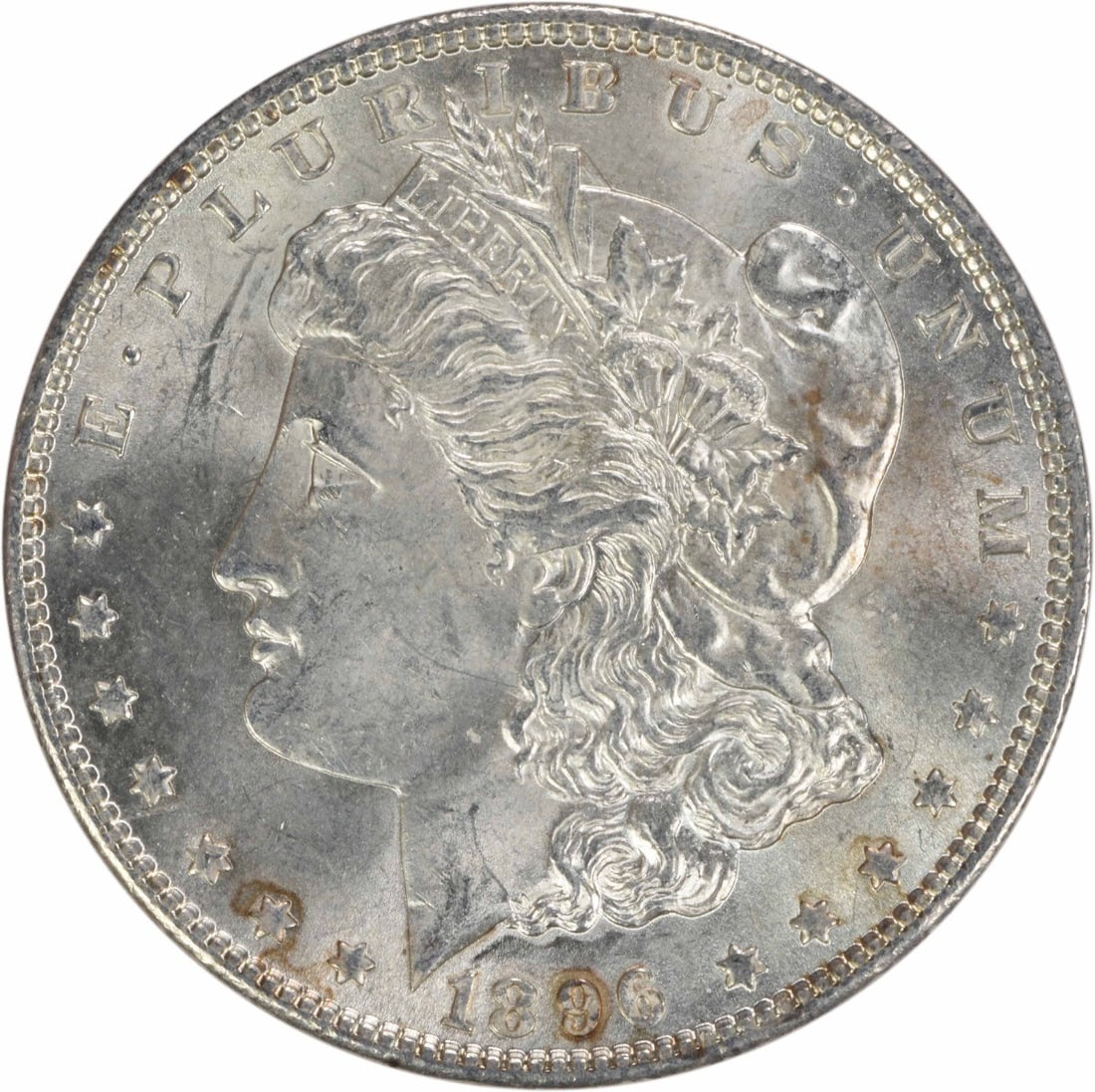 1896 Morgan Silver Dollar Choice BU Uncertified Silver Coin: 1896 Morgan Silver Dollar Choice BU Uncertified Silver Coin This 1896 Morgan Silver Dollar is a stunning example of American coinage, showcasing its Choice BU grade. The coin is uncirculated, indicati