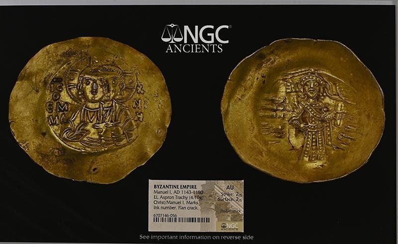 Byzantine El Aspron Trachy Manuel I 4.10g NGC AU Certified Coin: Byzantine El Aspron Trachy Manuel I 4.10g NGC AU Certified Coin This is a Byzantine El Aspron Trachy coin from the reign of Manuel I, dated AD 1143-1180. It has been graded AU by NGC, indicating its e