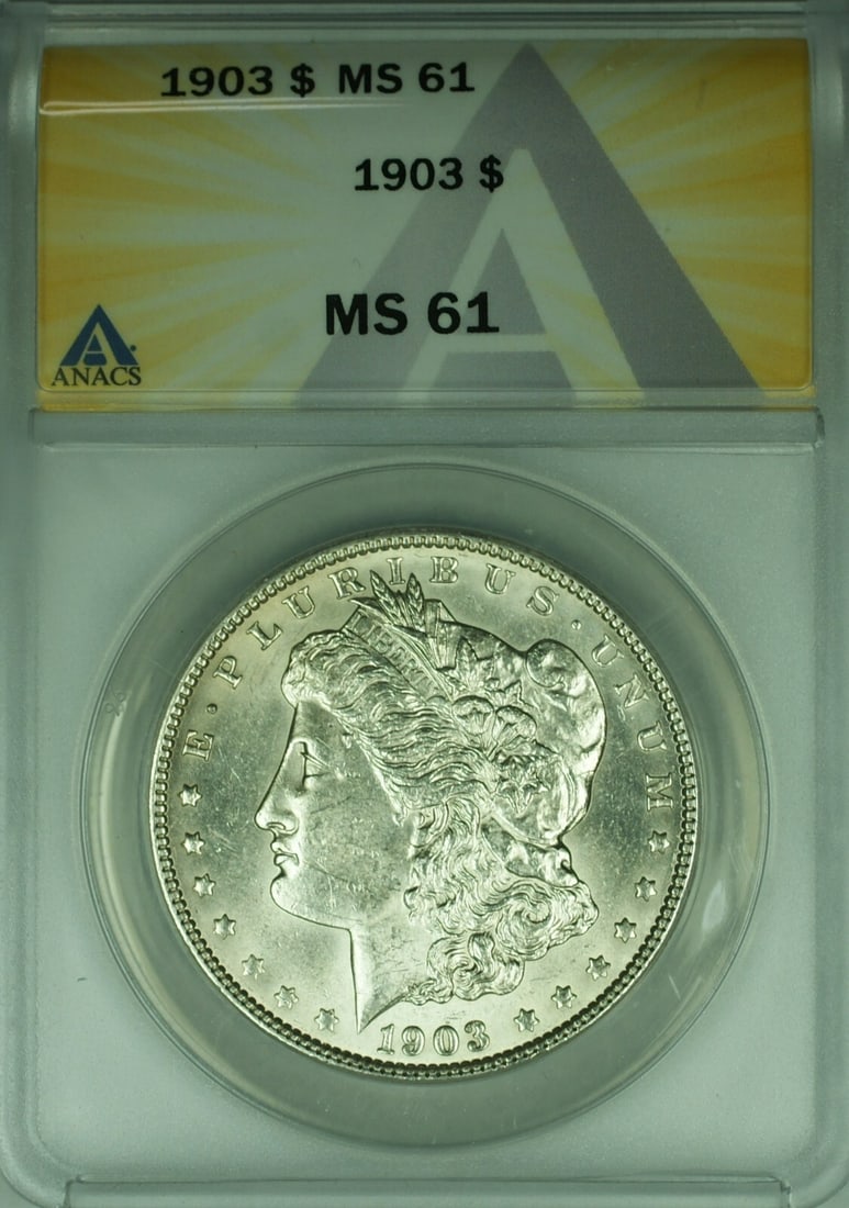1903 $1 Morgan Silver Dollar ANACS MS61 Philadelphia Mint: 1903 $1 Morgan Silver Dollar ANACS MS61 Philadelphia Mint This is an uncirculated 1903 Morgan Silver Dollar $1 coin from the United States, graded MS-61 by ANACS. Minted in Philadelphia, this coin is