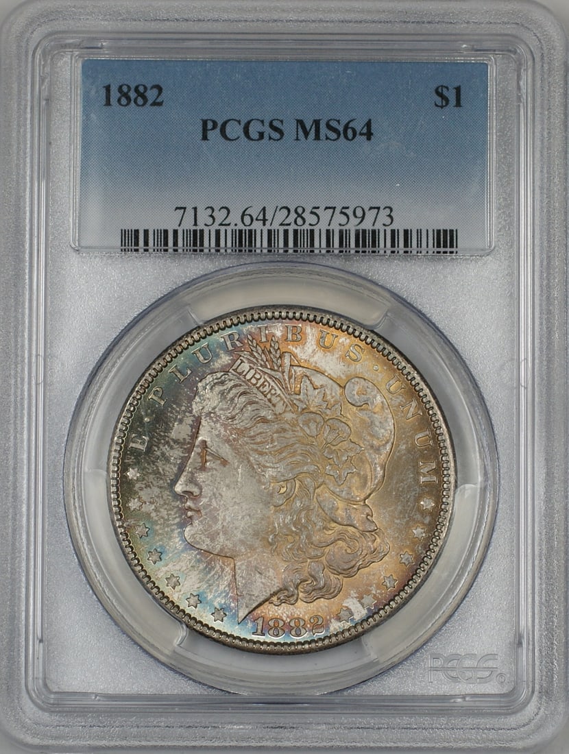 PCGS MS64 1882 Morgan Silver Dollar with Colorful Toning Philadelphia Mint: PCGS MS64 1882 Morgan Silver Dollar with Colorful Toning Philadelphia Mint This 1882 Morgan Silver Dollar features vibrant and colorful toning on both the obverse and reverse. Certified by PCGS with a