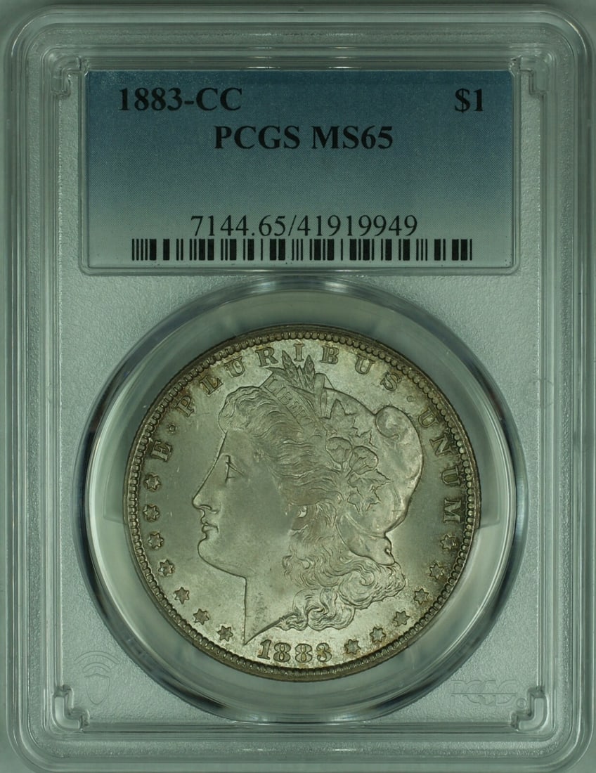 PCGS MS65 1883 Carson City Morgan Silver Dollar Toned Uncirculated: PCGS MS65 1883 Carson City Morgan Silver Dollar Toned Uncirculated This is an 1883-CC Morgan Silver Dollar graded MS-65 by PCGS. Minted in Carson City, this uncirculated coin features attractive tonin
