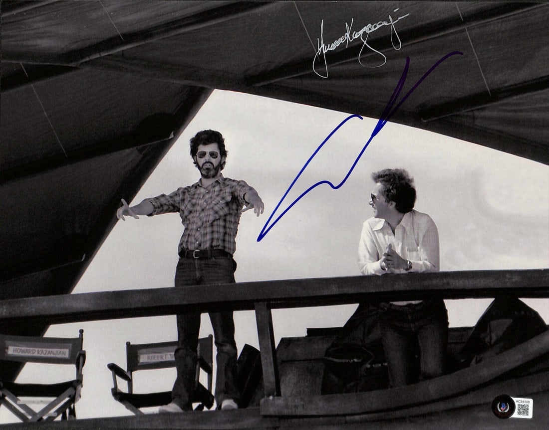11x14 Star Wars ROTJ Photo Signed by Lucas and Kazanjian Beckett Authenticated: 11x14 Star Wars ROTJ Photo Signed by Lucas and Kazanjian Beckett Authenticated This 11x14 color photograph features on-set signatures from both George Lucas, the creator and director of Star Wars, and