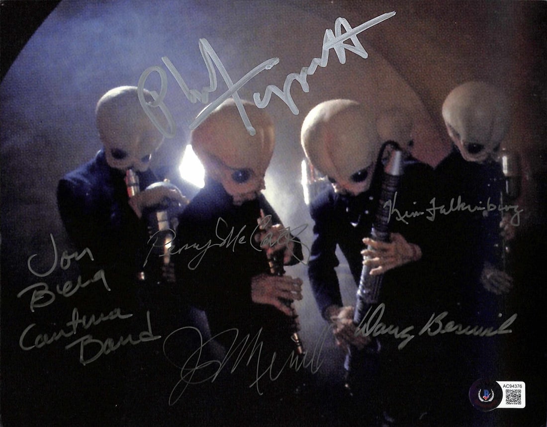 8x10 Photo Signed by Six Star Wars Cantina Band Actors Beckett Authenticated: 8x10 Photo Signed by Six Star Wars Cantina Band Actors Beckett Authenticated This is an original 8x10-inch color photograph featuring the legendary Cantina Band from Star Wars, signed in silver perman
