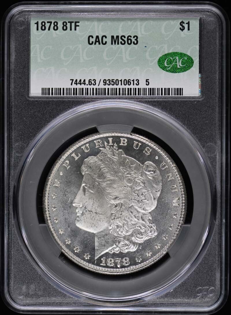 1878 Morgan Dollar CACG MS63 Uncirculated Philadelphia Mint: 1878 Morgan Dollar CACG MS63 Uncirculated Philadelphia Mint This exquisite 1878 Morgan Dollar is graded MS63 by CACG, a certification that attests to its uncirculated condition. Minted in Philadelphia