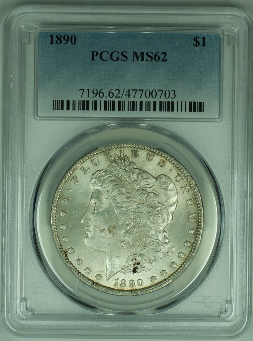 PCGS MS 62 Certified 1890 Morgan Silver Dollar Coin United States: PCGS MS 62 Certified 1890 Morgan Silver Dollar Coin United States This is an 1890 Morgan Silver Dollar coin from the United States, graded MS 62 by PCGS. The coin is uncirculated and composed of silve