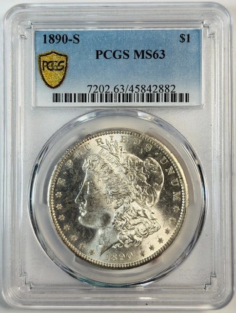 PCGS MS63 1890 San Francisco Morgan Silver Dollar Coin: PCGS MS63 1890 San Francisco Morgan Silver Dollar Coin This is an 1890 Morgan Silver Dollar minted in San Francisco, graded MS-63 by PCGS. The coin is uncirculated and composed of silver, offering bot
