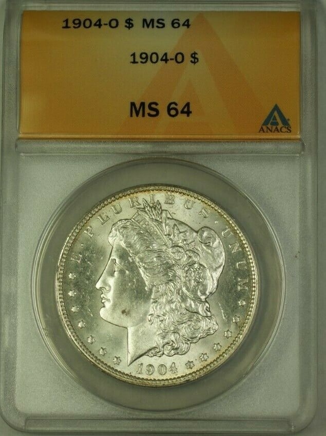 ANACS MS-64 1904-O Morgan Silver Dollar Uncirculated New Orleans Mint: ANACS MS-64 1904-O Morgan Silver Dollar Uncirculated New Orleans Mint This is a 1904-O Morgan Silver Dollar featuring a $1 denomination, minted in New Orleans. Certified by ANACS with a grade of MS-64