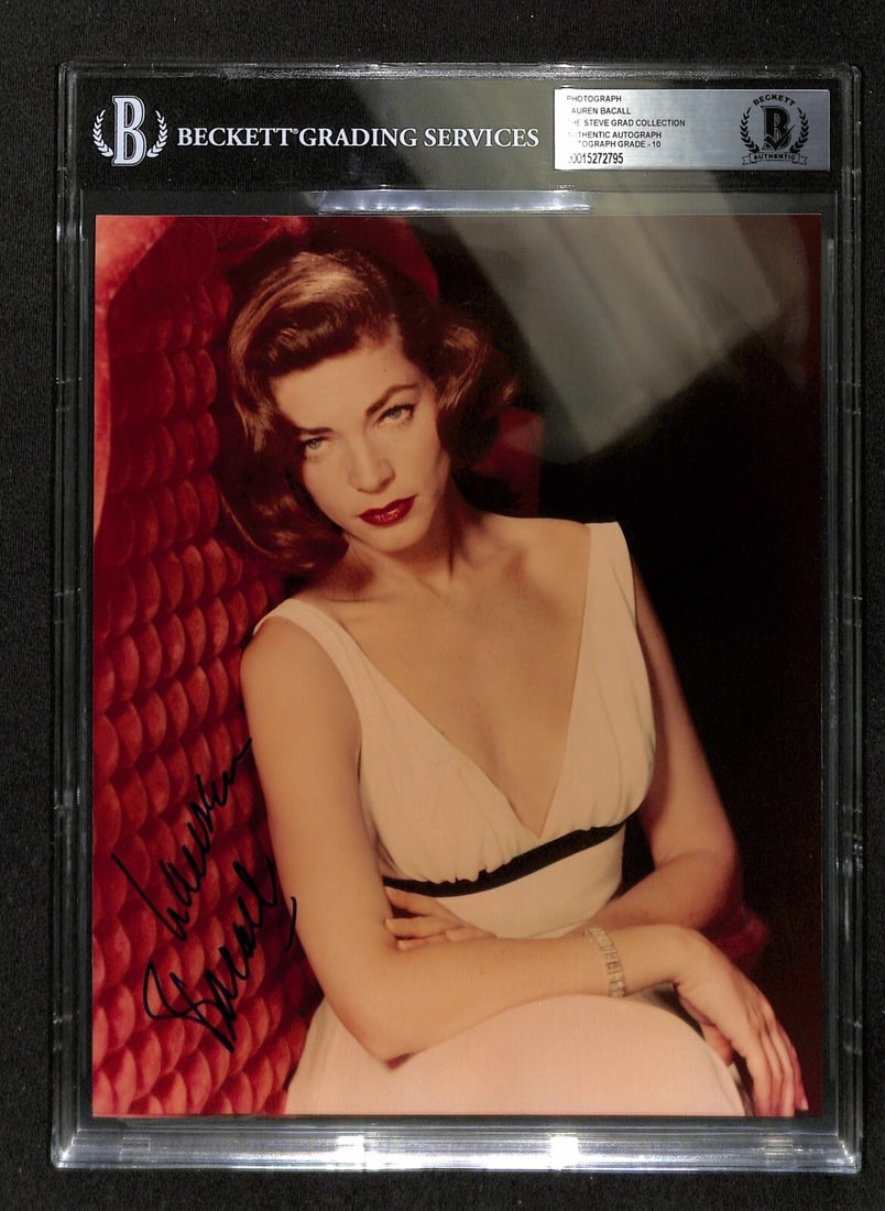 Lauren Bacall Autographed 8x10 Photo Beckett Graded 10 as Lucy Moore Hadley: Lauren Bacall Autographed 8x10 Photo Beckett Graded 10 as Lucy Moore Hadley This is an original 8x10 inch color photograph signed by actress Lauren Bacall as Lucy Moore Hadley from the movie "Written