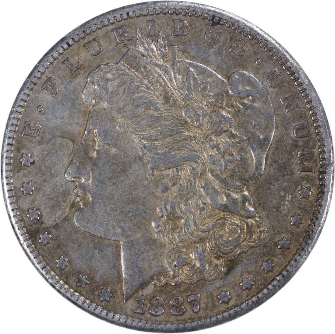 1887-S Morgan Silver Dollar AU Uncertified 90% Silver San Francisco: 1887-S Morgan Silver Dollar AU Uncertified 90% Silver San Francisco This 1887-S Morgan Silver Dollar is a remarkable piece of numismatic history, featuring a beautiful design by George T. Morgan. The
