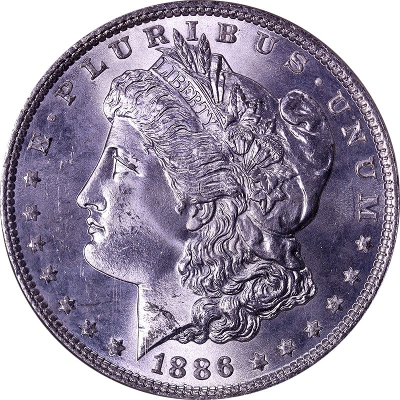 1886-P Morgan Silver Dollar NGC MS65 Uncirculated Coin with Strong Strike: 1886-P Morgan Silver Dollar NGC MS65 Uncirculated Coin with Strong Strike This stunning 1886-P Morgan Silver Dollar showcases superb eye appeal, featuring fantastic luster and a strong strike. Graded