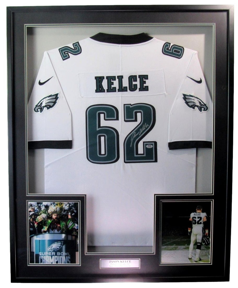 Framed Jason Kelce Signed Philadelphia Eagles Jersey PSA/DNA 201629: Framed Jason Kelce Signed Philadelphia Eagles Jersey PSA/DNA 201629 This item features a Jason Kelce Signed White Philadelphia Eagles Football Jersey, beautifully framed and ready for display. The jer