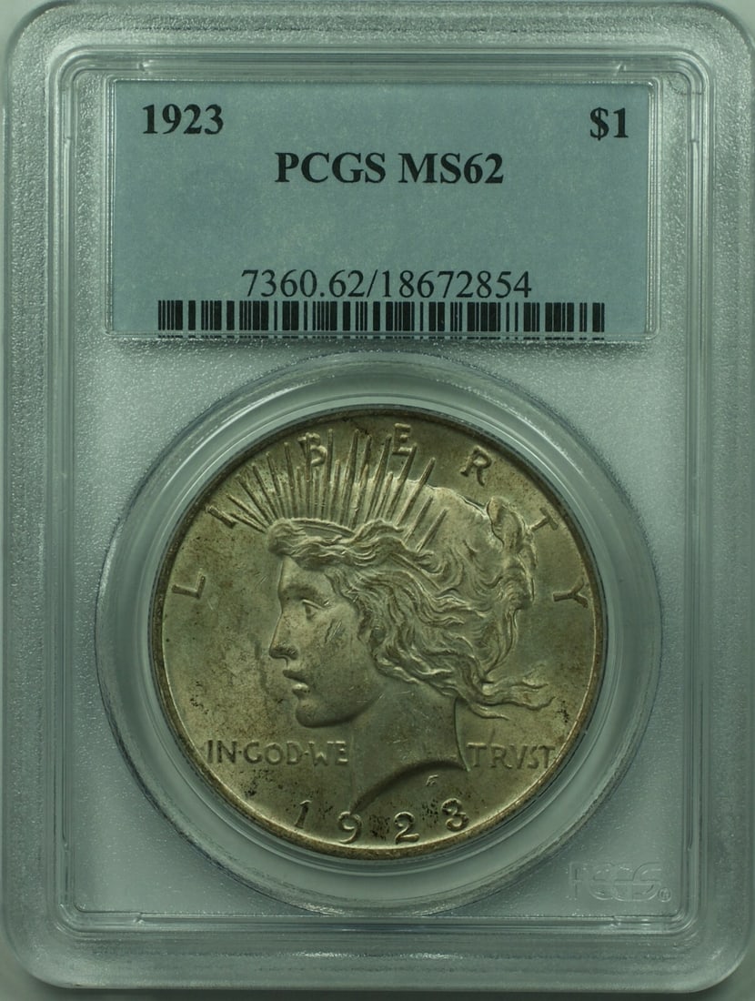 1923 PCGS MS62 Peace Dollar Silver Coin from Philadelphia Mint: 1923 PCGS MS62 Peace Dollar Silver Coin from Philadelphia Mint This 1923 Peace Silver Dollar is a one dollar coin from the United States, featuring a silver composition. Certified by PCGS with a grade