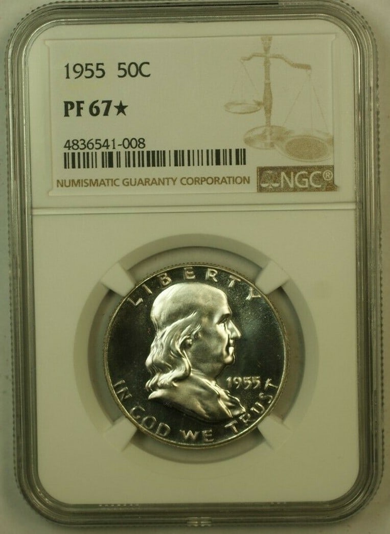 NGC PF-67 Star 1955 Franklin Half Dollar Silver Proof Cameo with Purple Obverse Toning: NGC PF-67 Star 1955 Franklin Half Dollar Silver Proof Cameo with Purple Obverse Toning This 1955 Franklin Half Dollar is certified by NGC with a PF-67* Star grade, indicating a high-quality proof coin