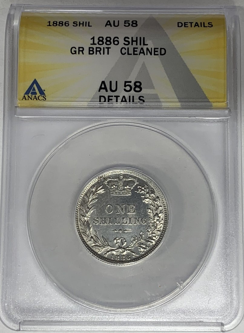 ANACS AU 58 Graded 1886 United Kingdom Shilling Cleaned: ANACS AU 58 Graded 1886 United Kingdom Shilling Cleaned This is an 1886 Great Britain Shilling coin graded AU 58 Details by ANACS. The coin has been cleaned and is in pre-owned condition. It is a cert
