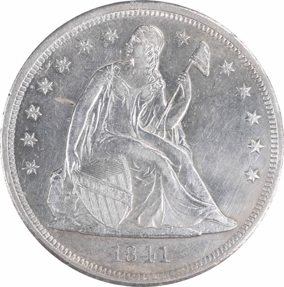 1841 Liberty Seated Silver Dollar AU Uncertified by Christian Gobrecht: 1841 Liberty Seated Silver Dollar AU Uncertified by Christian Gobrecht This 1841 Liberty Seated Silver Dollar is a remarkable piece of numismatic history, featuring the iconic Seated Liberty design by