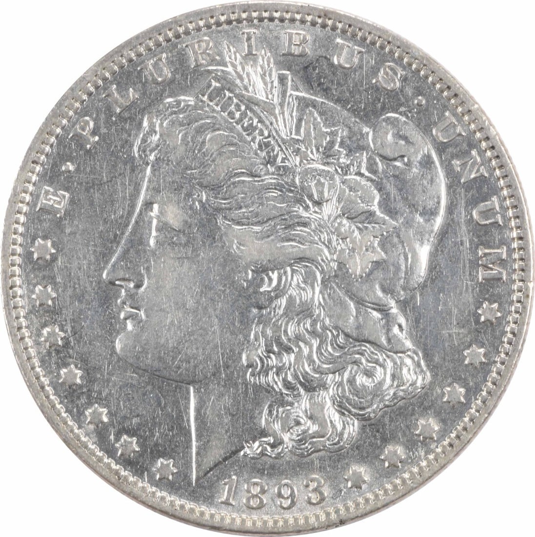 1893 Morgan Silver Dollar AU Uncertified Philadelphia Mint Coin: 1893 Morgan Silver Dollar AU Uncertified Philadelphia Mint Coin This 1893 Morgan Silver Dollar is a remarkable piece of American numismatic history, featuring a composition of 90% silver and 10% coppe