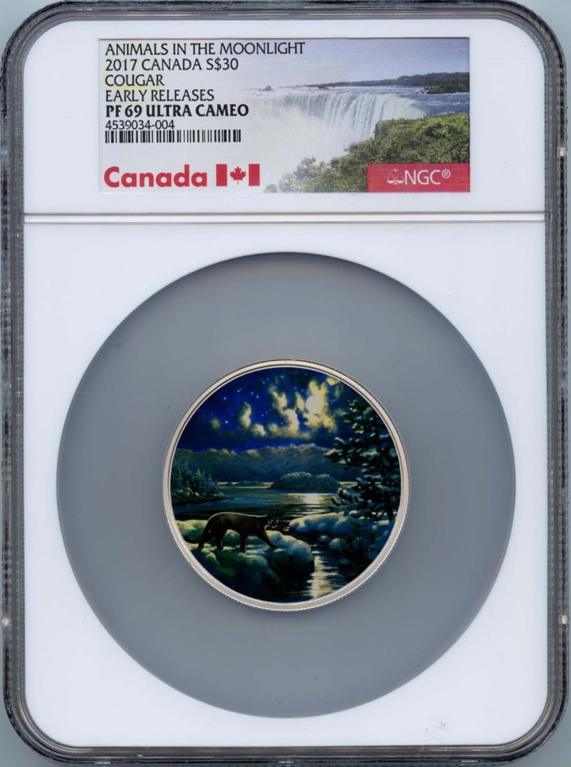 2017 Canada Cougar Glow in the Dark S$30 Coin NGC PR69DCAM: 2017 Canada Cougar Glow in the Dark S$30 Coin NGC PR69DCAM This 2017 Canada Cougar coin features a unique glow-in-the-dark design and has been graded PR69 by NGC, indicating it is in uncirculated cond