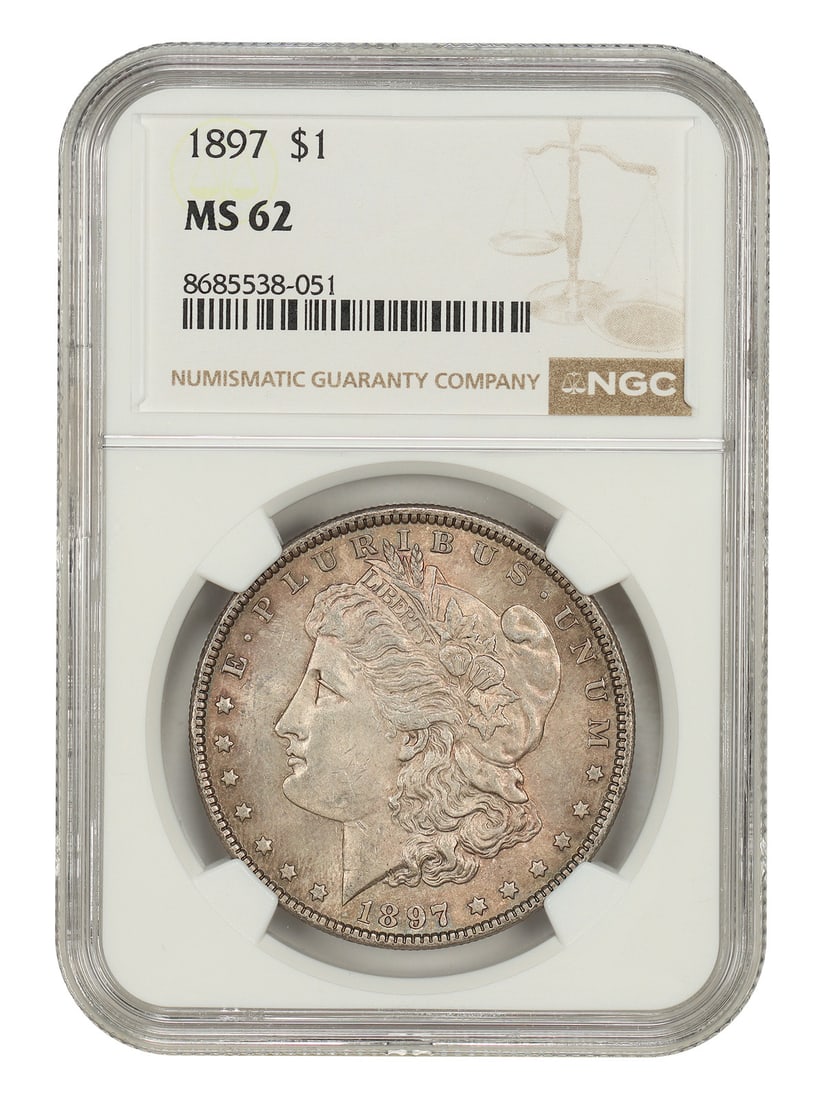 NGC MS62 1897 Morgan Silver Dollar Philadelphia Mint: NGC MS62 1897 Morgan Silver Dollar Philadelphia Mint This is an 1897 Morgan Dollar graded MS62 by NGC. Struck at the Philadelphia Mint, this uncirculated coin is part of the Morgan Dollar series and i