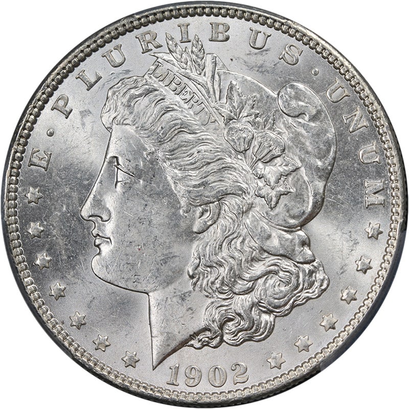 PCGS MS63 1902 Philadelphia Morgan Dollar Blast White Uncirculated Silver Coin: PCGS MS63 1902 Philadelphia Morgan Dollar Blast White Uncirculated Silver Coin This original 1902-P Morgan Silver Dollar is graded PCGS MS63 and features superb eye appeal with outstanding luster and